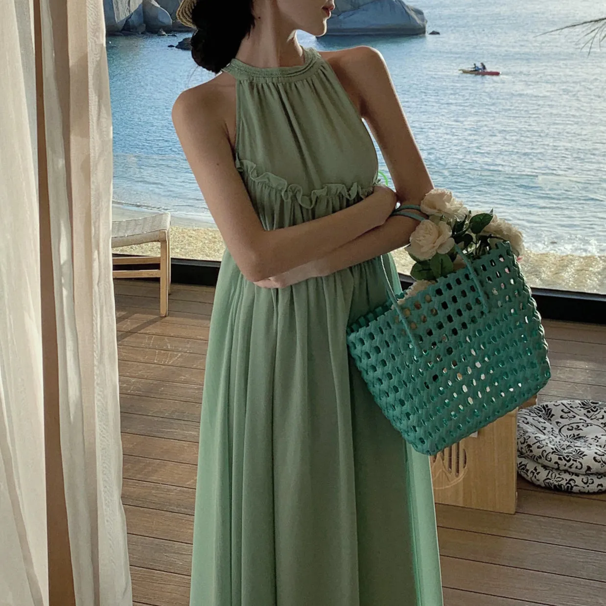 Stylish And Elegant Draped Textured Sleeveless Halterneck Holiday Dress